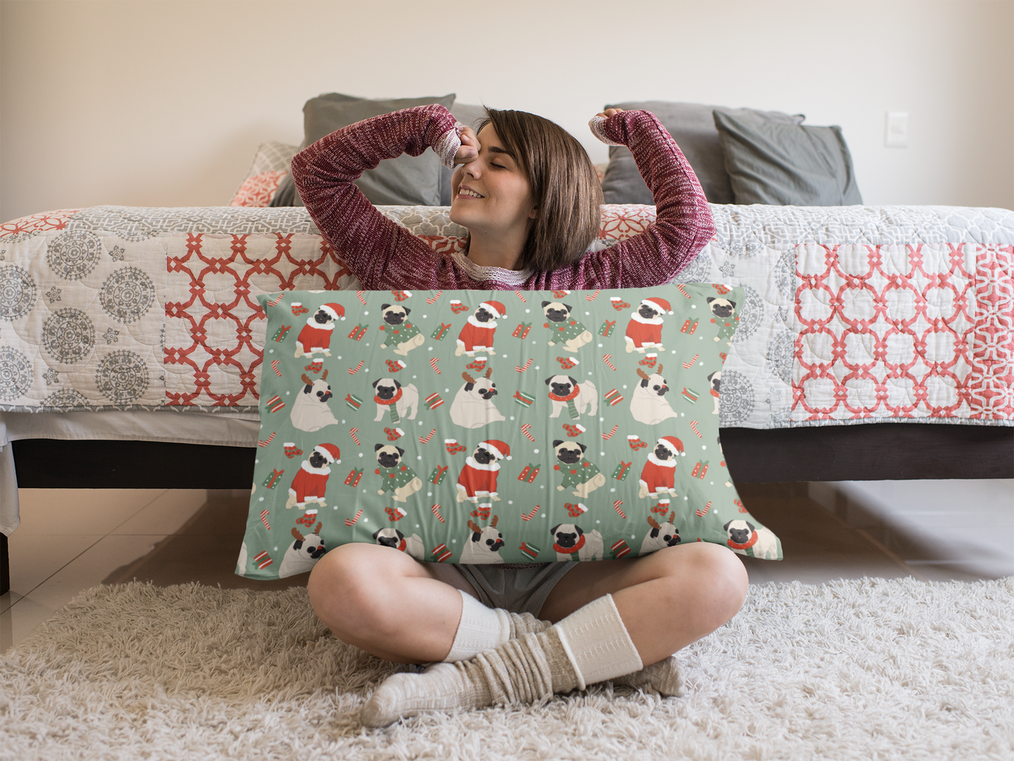 Lovely seamless Christmas pugs on a green background